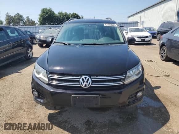 2017 Volkswagen Tiguan z VIN WVGHV7AXXHK023032, wystawiony jako Copart lot #67903025 z przebiegiem 203 953 mil mil oraz Czysty tytuł • Clean title. Historia ofert i sprzedaży dostępna na DreamBid. Obrazek 5.