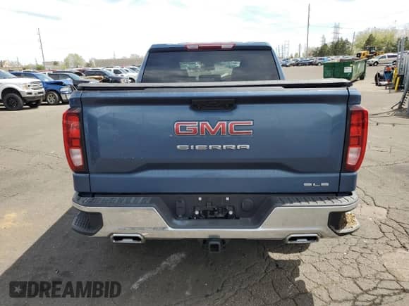 2024 GMC Sierra 1500 SLE z VIN 1GTUUBED7RZ324617, wystawiony jako Copart lot #53523125 z przebiegiem 1 047 mil mil oraz Szkoda całkowita • Salvage title. Historia ofert i sprzedaży dostępna na DreamBid. Obrazek 6.