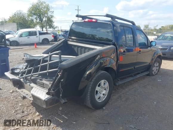 2005 Nissan Frontier SE with VIN 1N6AD07UX5C418604, listed as a IAAI auction lot 43196214 with 252,593 mi miles and . Bid and sale history available at DreamBid. Image 4.