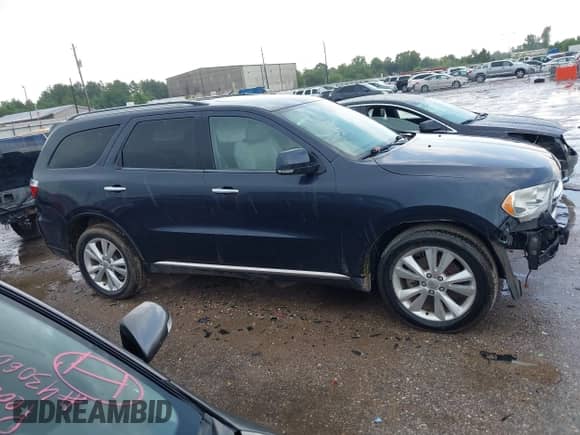 2013 Dodge Durango Crew z VIN 1C4SDHDT5DC637535, wystawiony jako IAAI lot #43064013 z przebiegiem 162 570 mil mil oraz . Historia ofert i sprzedaży dostępna na DreamBid. Obrazek 13.