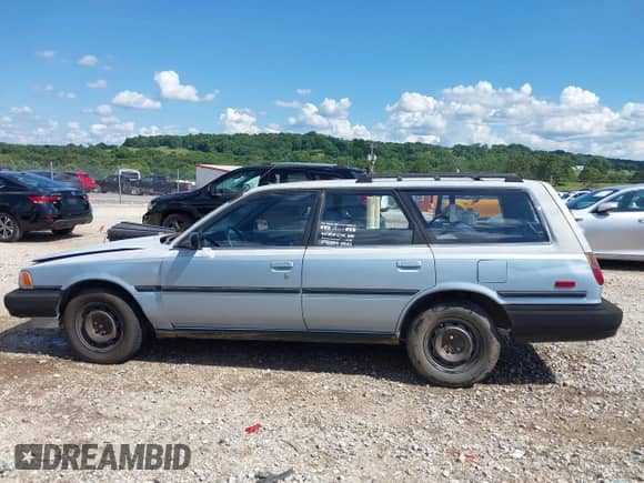 1990 Toyota Camry z VIN JT2SV21WXL0343081, wystawiony jako IAAI lot #42665207 z przebiegiem 212 900 mil mil oraz . Historia ofert i sprzedaży dostępna na DreamBid. Obrazek 14.