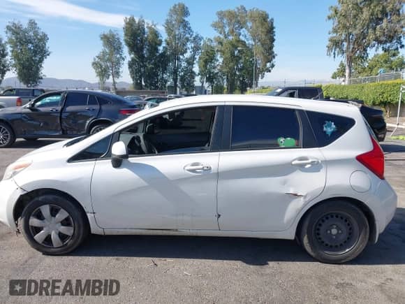 2014 Nissan Note SV z VIN 3N1CE2CP1EL427364, wystawiony jako IAAI lot #42678715 z przebiegiem 106 850 mil mil oraz . Historia ofert i sprzedaży dostępna na DreamBid. Obrazek 14.