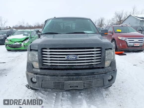 2012 Ford F-150 Lariat with VIN 1FTFW1E64CFA84580, listed as a IAAI auction lot 41628476 with 63,412 mi miles and . Bid and sale history available at DreamBid. Image 12.