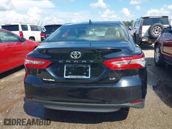2020 Toyota Camry LE with VIN 4T1C11AKXLU877796, listed as a IAAI auction lot 43384594 with 78,546 mi miles and . Bid and sale history available at DreamBid. Image 16.