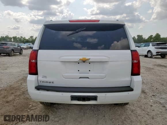 2020 Chevrolet Tahoe LT z VIN 1GNSKBKC7LR301863, wystawiony jako Copart lot #68294725 z przebiegiem 78 866 mil mil oraz Szkoda całkowita • Salvage title. Historia ofert i sprzedaży dostępna na DreamBid. Obrazek 6.