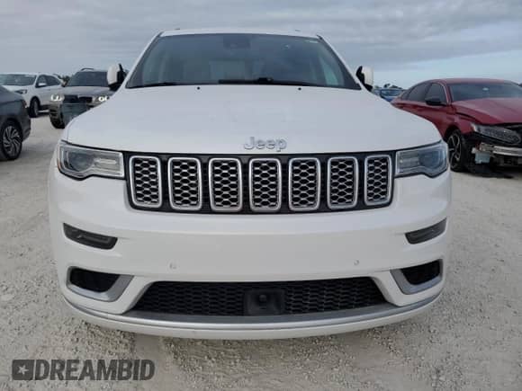2021 Jeep Grand Cherokee Summit с VIN 1C4RJFJG2MC588782, выставлен на аукционе Copart как лот 77001134 с пробегом Не указан миль и На запчасти • Non repairable. История ставок и продаж доступна на DreamBid. Изображение 5.