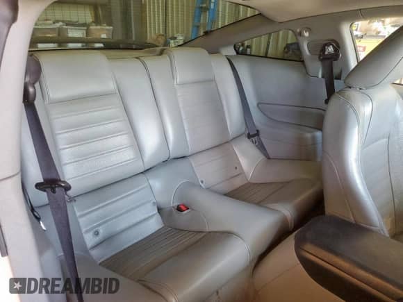 2007 Ford Mustang GT Deluxe z VIN 1ZVFT82H275239465, wystawiony jako Copart lot #58575635 z przebiegiem 128 481 mil mil oraz Szkoda całkowita • Salvage title. Historia ofert i sprzedaży dostępna na DreamBid. Obrazek 10.