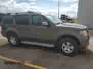 2005 Nissan Pathfinder SE z VIN 5N1AR18W95C762446, wystawiony jako Copart lot #70383415 z przebiegiem 195 981 mil mil oraz Szkoda całkowita • Salvage title. Historia ofert i sprzedaży dostępna na DreamBid. Obrazek 4.