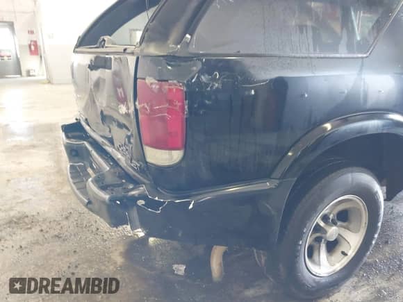 2001 Chevrolet Blazer LS with VIN 1GNCS18W51K260297, listed as a IAAI auction lot 41697909 with 144,564 mi miles and . Bid and sale history available at DreamBid. Image 18.