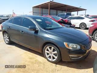 2016 Volvo S60 T5 Drive-E Premier z VIN YV126MFK4G2409957, wystawiony jako IAAI lot #41993257 z przebiegiem 102 420 mil mil oraz . Historia ofert i sprzedaży dostępna na DreamBid. Obrazek 1.