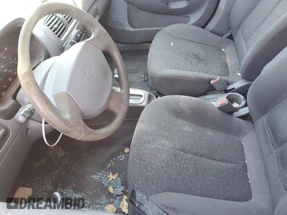 2002 Hyundai Accent GL с VIN KMHCG45C32U332833, выставлен на аукционе Copart как лот 66539644 с пробегом 69 763 миль миль и Списание • Salvage title. История ставок и продаж доступна на DreamBid. Изображение 7.