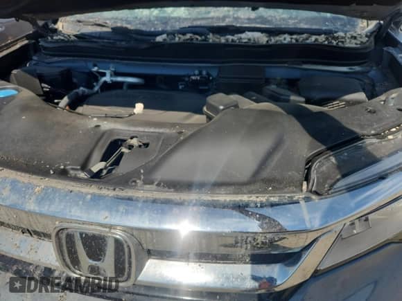 2022 Honda Pilot Touring 7-Passenger z VIN 5FNYF6H68NB077916, wystawiony jako Copart lot #84418935 z przebiegiem 24 400 mil mil oraz Szkoda całkowita • Salvage title. Historia ofert i sprzedaży dostępna na DreamBid. Obrazek 12.