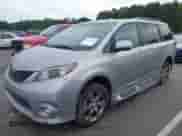 2014 Toyota Sienna SE with VIN 5TDXK3DC6ES421515, listed as a IAAI auction lot 43102179 with 63,756 mi miles and . Bid and sale history available at DreamBid. Image 6.