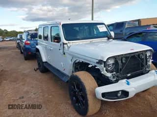 2021 Jeep Wrangler Unlimited Sahara z VIN 1C4JJXP64MW840094, wystawiony jako IAAI lot #40830676 z przebiegiem 31 716 mil mil oraz . Historia ofert i sprzedaży dostępna na DreamBid. Obrazek 1.