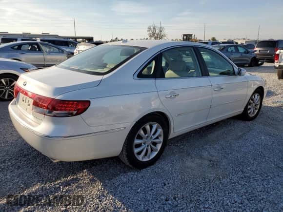 2007 Hyundai Azera SE с VIN KMHFC46F57A237734, выставлен на аукционе Copart как лот 89120545 с пробегом 26 445 миль миль и Списание • Salvage title. История ставок и продаж доступна на DreamBid. Изображение 3.