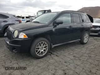 2007 Jeep Compass Sport with VIN 1J8FT47W47D180968, listed as a Copart auction lot 84296085 with 96,757 mi miles and Salvage title. Bid and sale history available at DreamBid. Image 1.