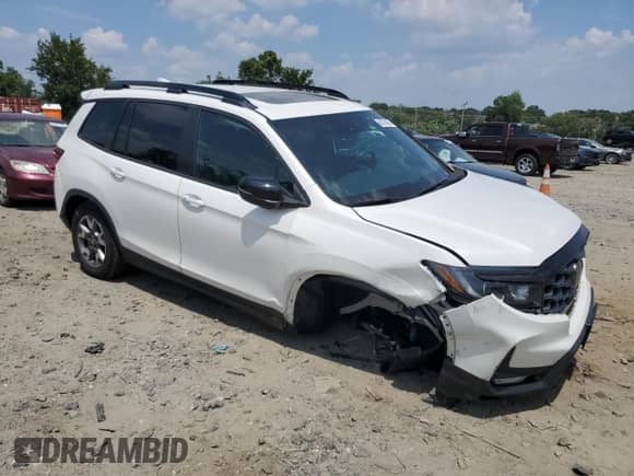 2023 Honda Passport TrailSport с VIN 5FNYF8H69PB023104, выставлен на аукционе Copart как лот 66778505 с пробегом 60 081 миль миль и Списание • Salvage title. История ставок и продаж доступна на DreamBid. Изображение 4.