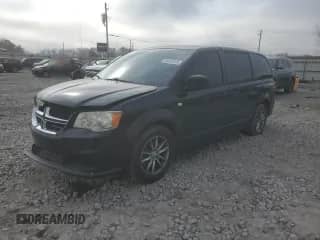 2014 Dodge Grand Caravan SXT with VIN 2C4RDGBG2ER251033, listed as a Copart auction lot 44010125 with 121,149 mi miles and Salvage title. Bid and sale history available at DreamBid. Image 1.