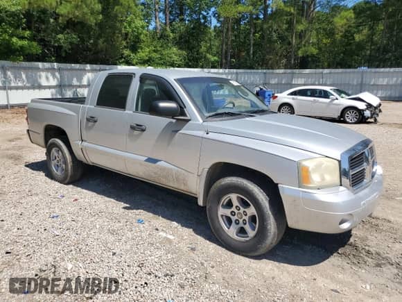 2007 Dodge Dakota SLT z VIN 1D7HE48P67S218445, wystawiony jako Copart lot #61587285 z przebiegiem 173 377 mil mil oraz Czysty tytuł • Clean title. Historia ofert i sprzedaży dostępna na DreamBid. Obrazek 4.