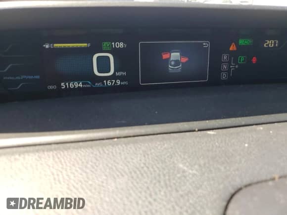 2018 Toyota Prius Plus z VIN JTDKARFP7J3099284, wystawiony jako Copart lot #58186915 z przebiegiem 51 694 mil mil oraz Szkoda całkowita • Salvage title. Historia ofert i sprzedaży dostępna na DreamBid. Obrazek 9.