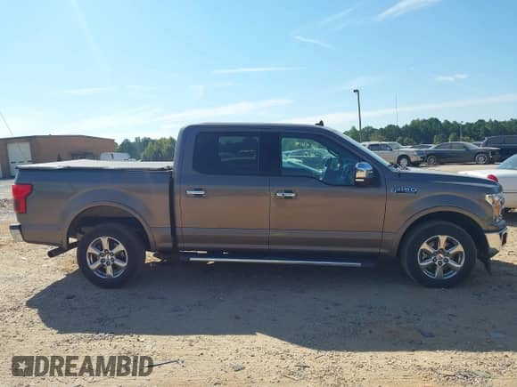 2020 Ford F-150 XLT z VIN 1FTEW1CP7LFA08701, wystawiony jako IAAI lot #43251685 z przebiegiem 94 333 mil mil oraz . Historia ofert i sprzedaży dostępna na DreamBid. Obrazek 13.