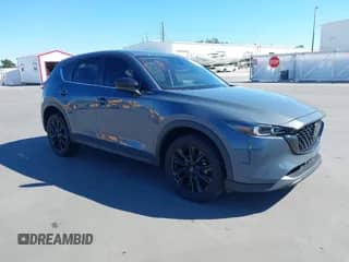2023 Mazda CX-5 S Preferred z VIN JM3KFBCM4P0289418, wystawiony jako IAAI lot #43404635 z przebiegiem 42 300 mil mil oraz . Historia ofert i sprzedaży dostępna na DreamBid. Obrazek 1.