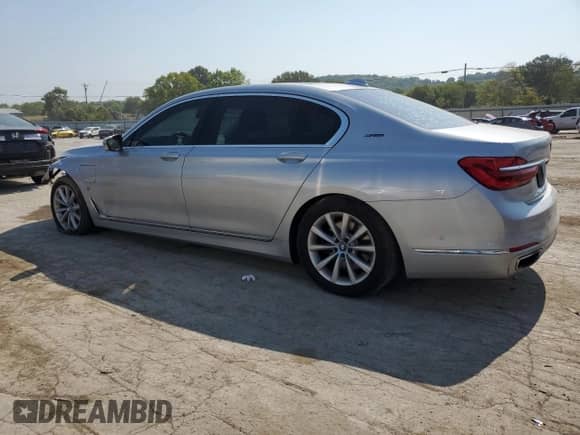 2018 BMW 7 Series 740e xDrive with VIN WBA7J2C51JG938447, listed as a Copart auction lot 63021064 with 81,105 mi miles and Salvage title. Bid and sale history available at DreamBid. Image 2.