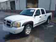 2007 Dodge Dakota SLT с VIN 1D7HW48P37S122785, выставлен на аукционе IAAI как лот 43053613 с пробегом 192 429 миль миль и . История ставок и продаж доступна на DreamBid. Изображение 2.
