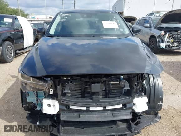 2025 Mazda CX-5 S Preferred z VIN JM3KFBCL5S0695658, wystawiony jako IAAI lot #43301142 z przebiegiem Nie podano mil oraz . Historia ofert i sprzedaży dostępna na DreamBid. Obrazek 12.