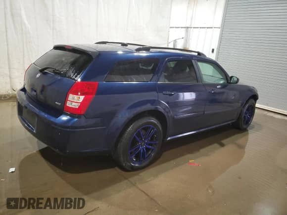 2005 Dodge Magnum SXT with VIN 2D4GZ48V95H537435, listed as a Copart auction lot 74198134 with 84,164 mi miles and Salvage title. Bid and sale history available at DreamBid. Image 3.