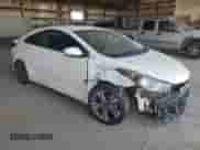 2014 Hyundai Elantra with VIN KMHDH6AH0EU024487, listed as a Copart auction lot 64279935 with 88,989 mi miles and Salvage title. Bid and sale history available at DreamBid. Image 4.