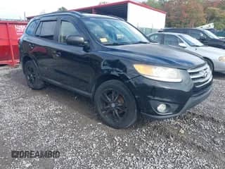 2012 Hyundai Santa Fe SE z VIN 5XYZH4AG5CG096869, wystawiony jako IAAI lot #43278076 z przebiegiem 185 721 mil mil oraz . Historia ofert i sprzedaży dostępna na DreamBid. Obrazek 1.