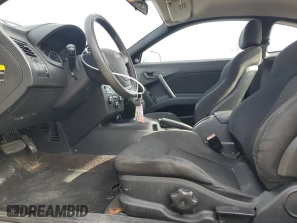 2008 Hyundai Tiburon GS с VIN KMHHM66D78U284232, выставлен на аукционе Copart как лот 77990564 с пробегом 107 448 миль миль и На запчасти • Non repairable. История ставок и продаж доступна на DreamBid. Изображение 7.