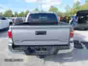 2021 Toyota Tacoma SR with VIN 3TYCZ5ANXMT024937, listed as a IAAI auction lot 43314888 with 77,580 mi miles and . Bid and sale history available at DreamBid. Image 16.