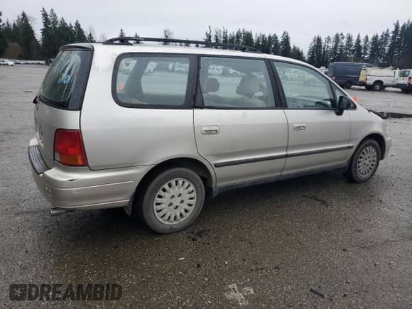 1997 Honda Odyssey LX с VIN JHMRA1860VC016884, выставлен на аукционе Copart как лот 48808545 с пробегом 198 072 миль миль и Списание • Salvage title. История ставок и продаж доступна на DreamBid. Изображение 3.