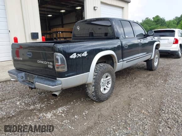 2004 Dodge Dakota SLT with VIN 1D7HG48N94S740006, listed as a IAAI auction lot 42241181 with 221,192 mi miles and . Bid and sale history available at DreamBid. Image 4.