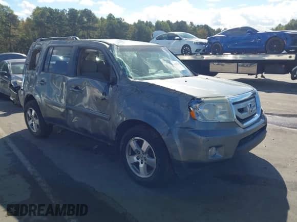 2009 Honda Pilot EX with VIN 5FNYF48479B002617, listed as a IAAI auction lot 43387010 with 216,517 mi miles and . Bid and sale history available at DreamBid. Image 1.