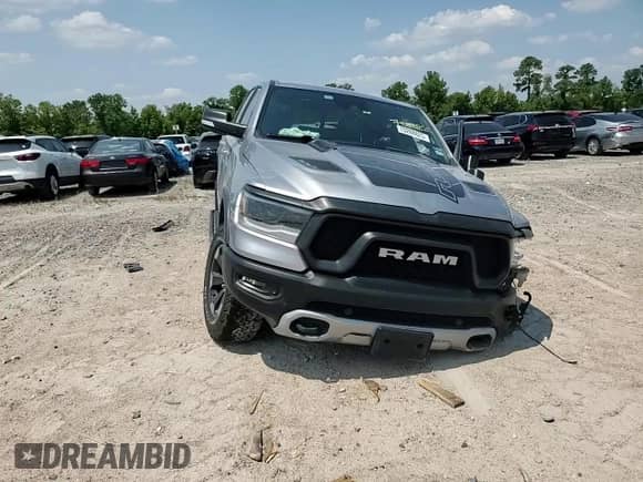 2020 Ram 1500 Rebel z VIN 1C6SRFLT4LN403520, wystawiony jako Copart lot #70288825 z przebiegiem 70 547 mil mil oraz Szkoda całkowita • Salvage title. Historia ofert i sprzedaży dostępna na DreamBid. Obrazek 14.