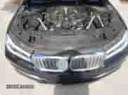 2018 BMW 7 Series 750i с VIN WBA7F0C52JGM24063, выставлен на аукционе Copart как лот 65798794 с пробегом 89 924 миль миль и Чистый • Clean title. История ставок и продаж доступна на DreamBid. Изображение 11.