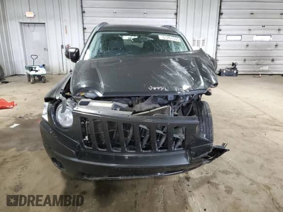 2010 Jeep Compass Sport z VIN 1J4NT1FB3AD647153, wystawiony jako Copart lot #61261595 z przebiegiem Nie podano mil oraz Nie do naprawy • Non repairable. Historia ofert i sprzedaży dostępna na DreamBid. Obrazek 5.