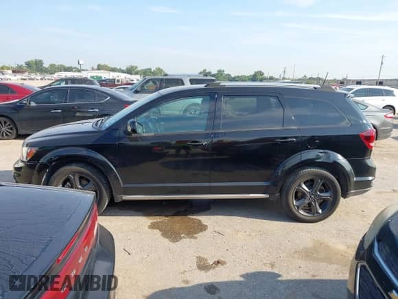 2019 Dodge Journey Crossroad with VIN 3C4PDCGG2KT803373, listed as a IAAI auction lot 43221708 with 184,529 mi miles and . Bid and sale history available at DreamBid. Image 14.