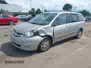 2010 Toyota Sienna XLE z VIN 5TDYK4CC0AS299093, wystawiony jako IAAI lot #43110403 z przebiegiem 252 738 mil mil oraz . Historia ofert i sprzedaży dostępna na DreamBid. Obrazek 2.