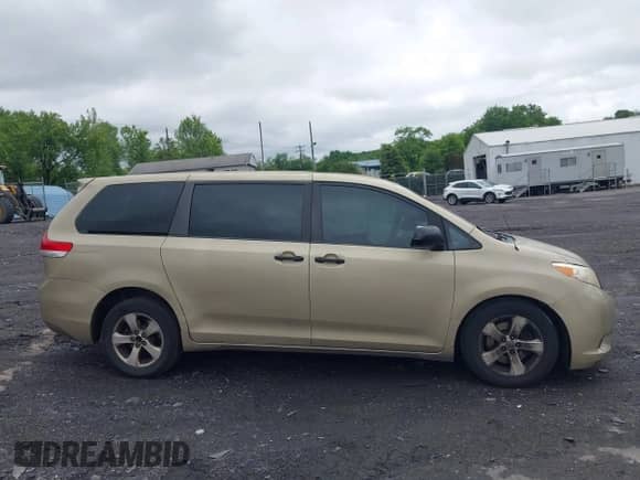 2014 Toyota Sienna L with VIN 5TDZK3DC2ES522589, listed as a IAAI auction lot 42457609 with 222,836 mi miles and . Bid and sale history available at DreamBid. Image 13.