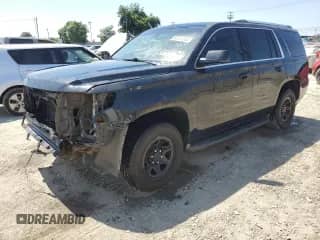 2015 Chevrolet Tahoe Commercial with VIN 1GNLC2EC9FR650069, listed as a Copart auction lot 67013555 with 245,856 mi miles and Salvage title. Bid and sale history available at DreamBid. Image 1.