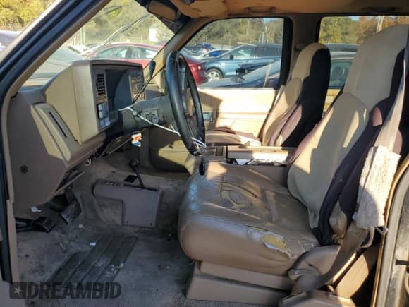 1994 Chevrolet Suburban с VIN 1GNFK16K0RJ417930, выставлен на аукционе Copart как лот 77583634 с пробегом 252 477 миль миль и Списание • Salvage title. История ставок и продаж доступна на DreamBid. Изображение 7.