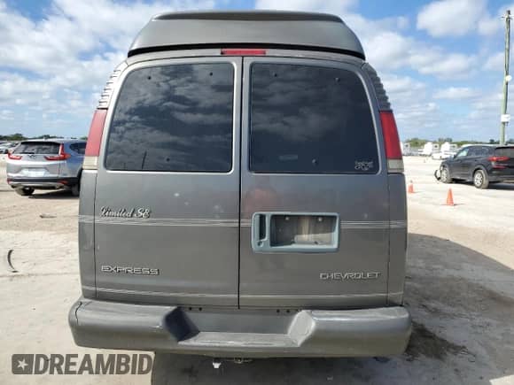 2000 Chevrolet Express Cargo YF7 with VIN 1GBFG15RXY1264551, listed as a Copart auction lot 88008385 with 206,407 mi miles and Salvage title. Bid and sale history available at DreamBid. Image 6.