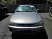 1995 Toyota Camry DX z VIN 4T1SK11E8SU476166, wystawiony jako Copart lot #67434345 z przebiegiem 205 053 mil mil oraz Czysty tytuł • Clean title. Historia ofert i sprzedaży dostępna na DreamBid. Obrazek 5.