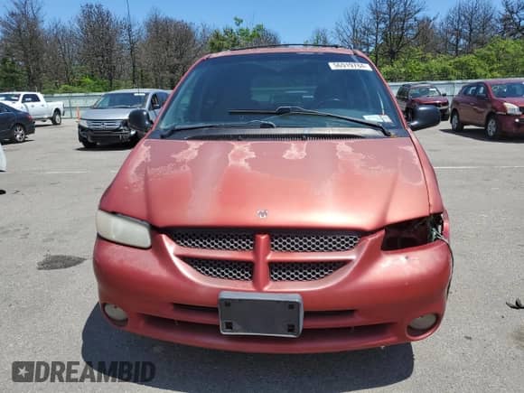 2000 Dodge Caravan SE с VIN 1B4GP44R7YB779226, выставлен на аукционе Copart как лот 56919784 с пробегом 202 679 миль миль и Списание • Salvage title. История ставок и продаж доступна на DreamBid. Изображение 5.