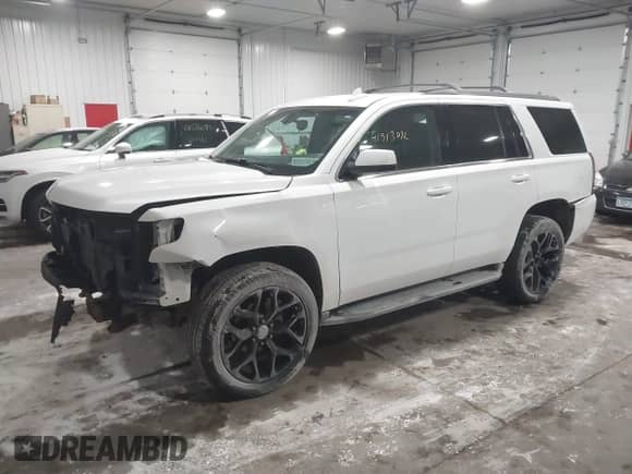 2018 Chevrolet Tahoe LS with VIN 1GNSKAKC5JR379467, listed as a IAAI auction lot 41513072 with 112,184 mi miles and . Bid and sale history available at DreamBid. Image 2.