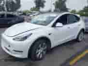 2023 Tesla Model Y Long Range with VIN 7SAYGAEE2PF763662, listed as a IAAI auction lot 43412618 with 43,857 mi miles and . Bid and sale history available at DreamBid. Image 20.